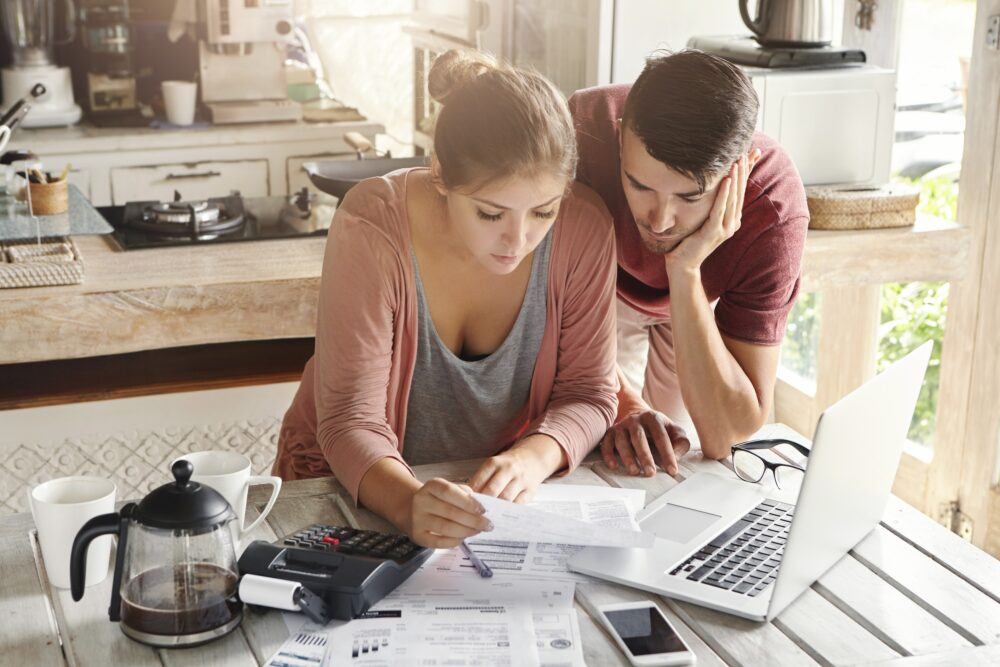 Couple in Home Reviewing Inflation Reduction Act for HVAC upgrades in Vancouver, WA